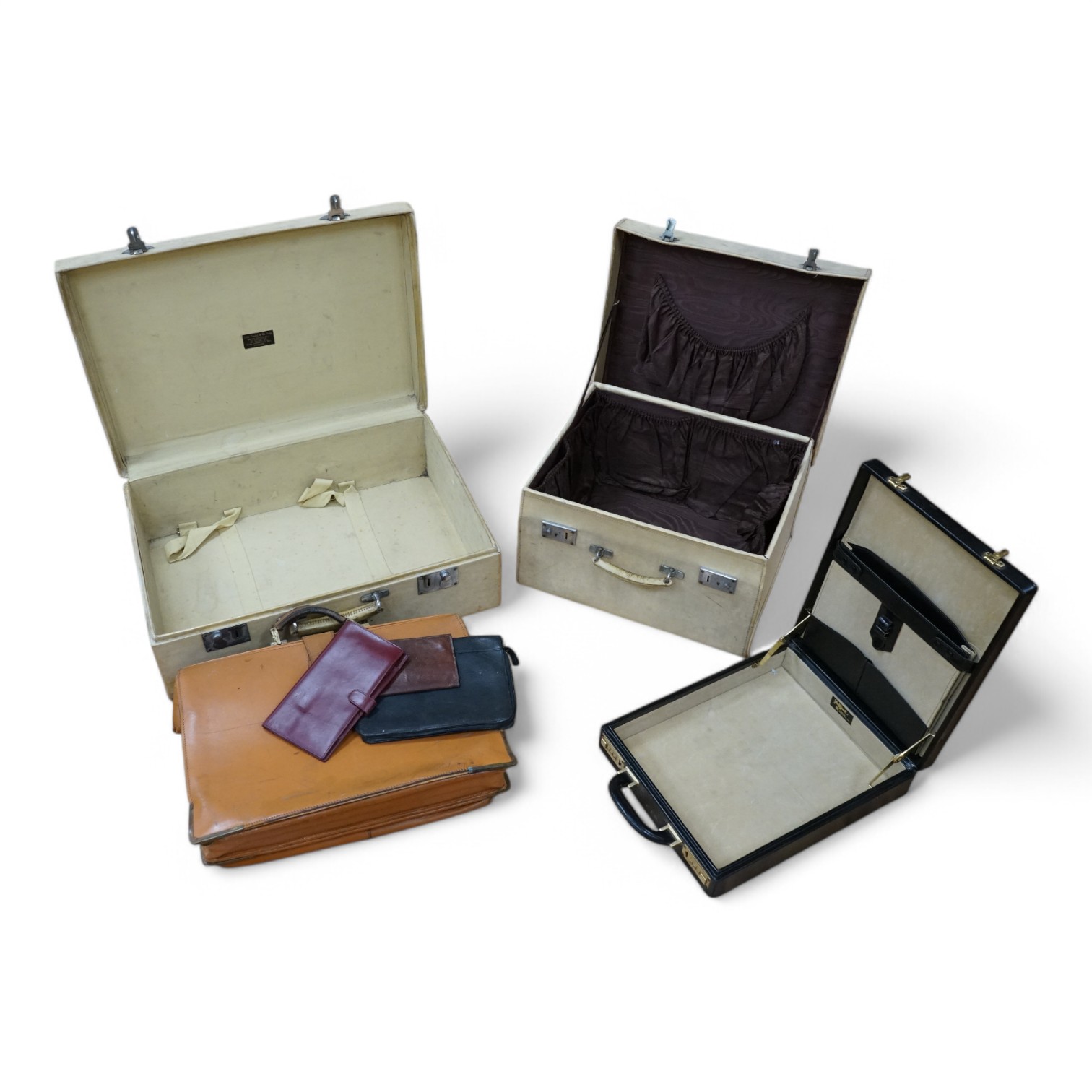 Two calf-skin vellum cases, one with watered silk lining and others. Condition - fair